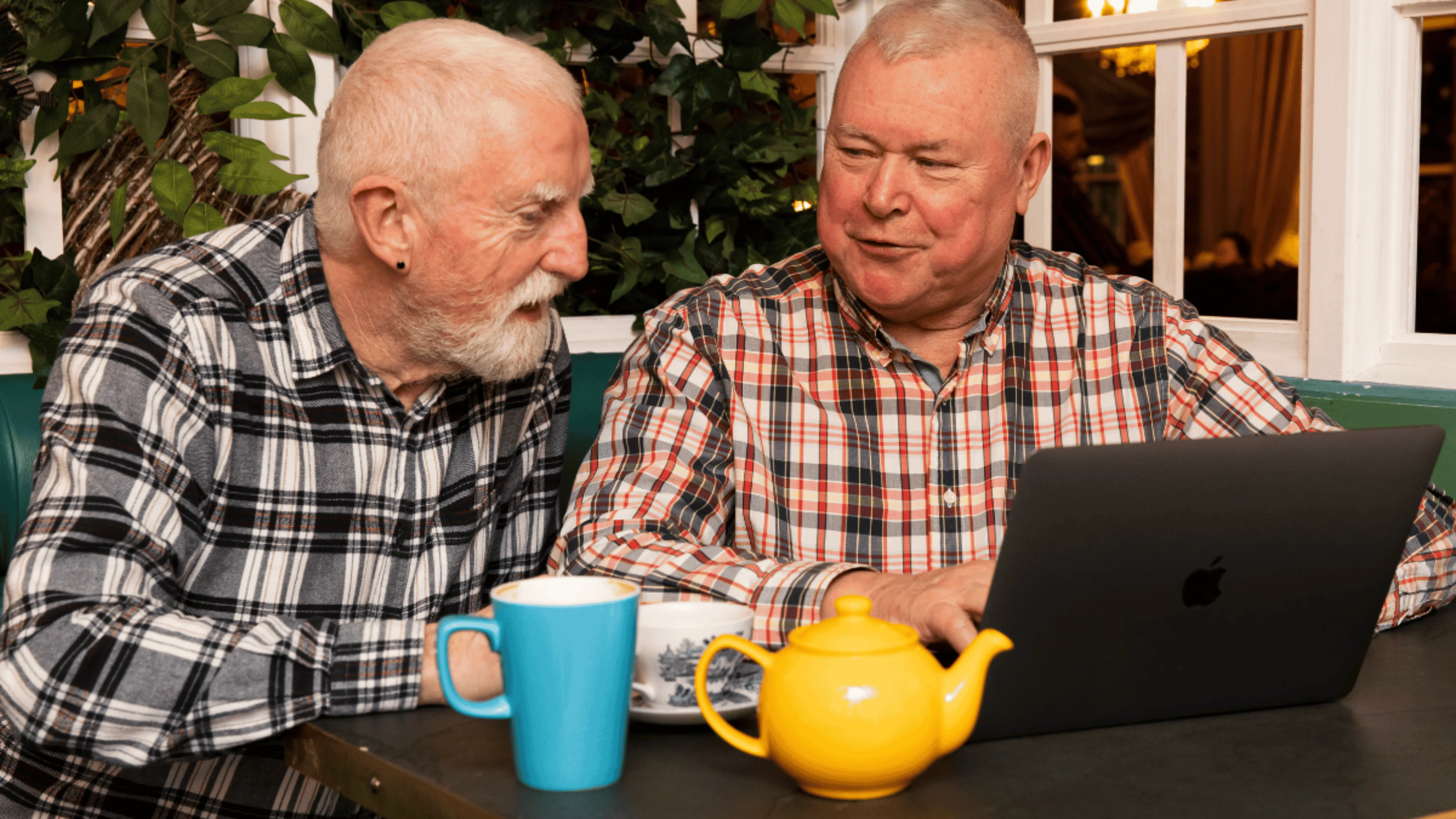 Men looking at laptop